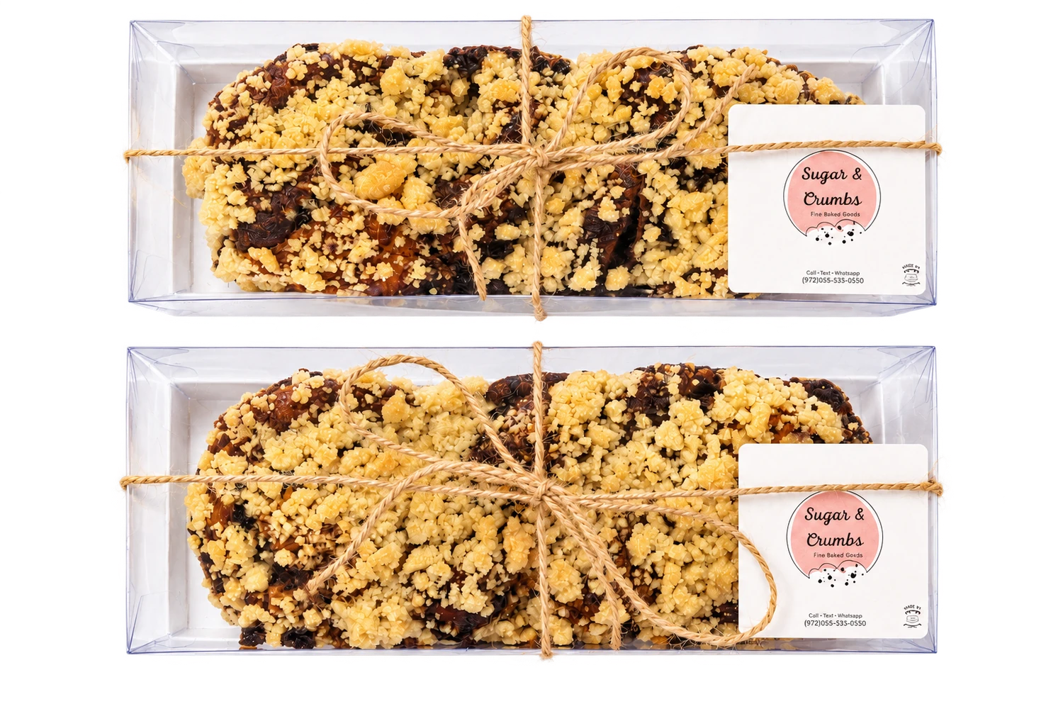 Two hand-twisted Sugar and Crumbs chocolate babka loaves boxed for delivery
