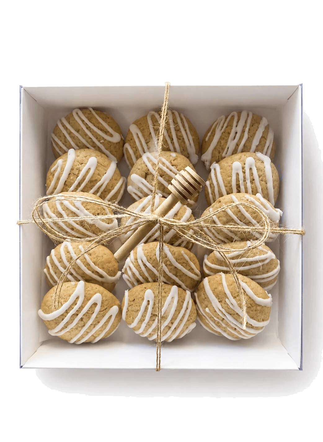 A seasonal box of glazed cookies tied with twine